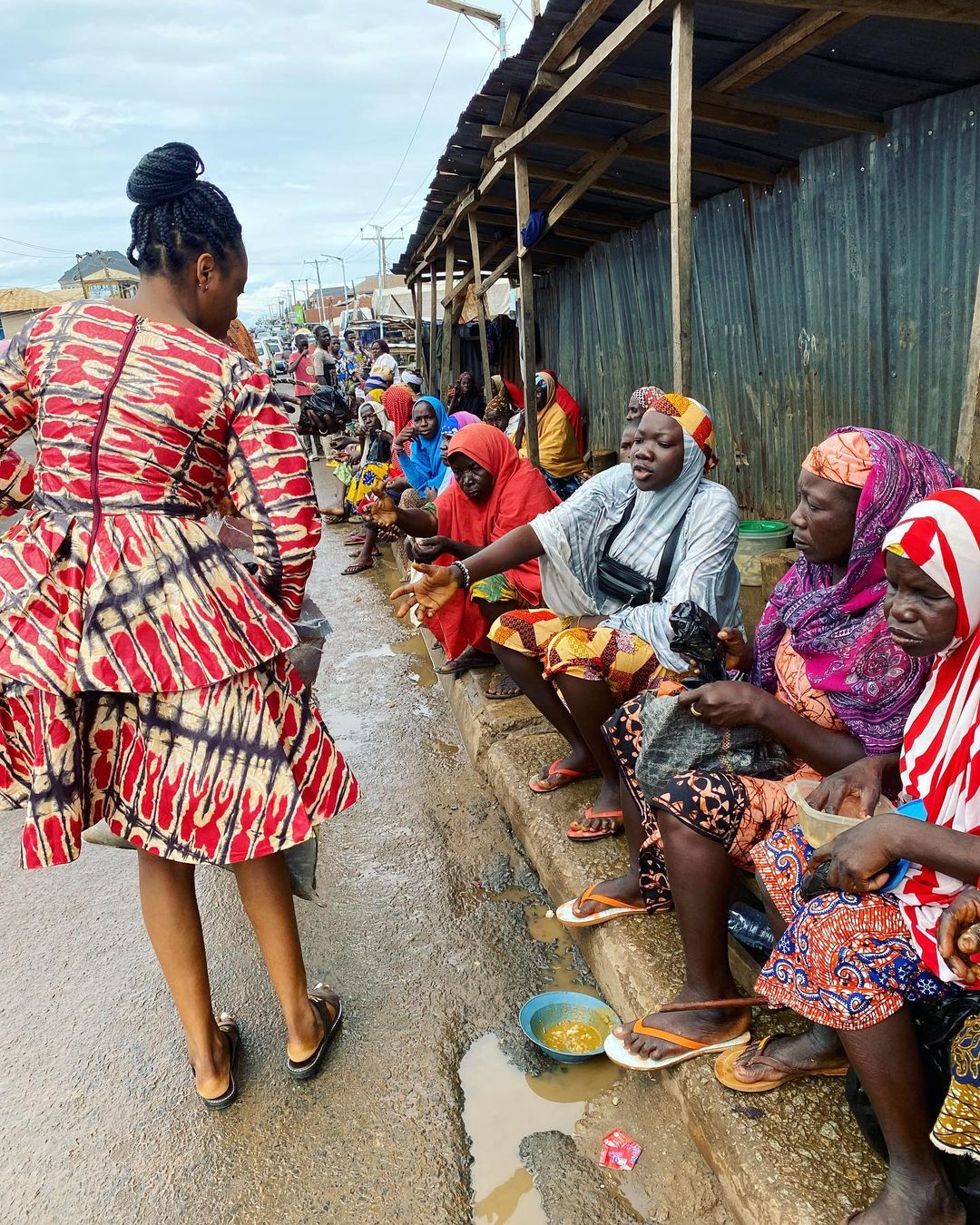 The beneficiary of QMA 2021 engaging in charitable giving to support the less privileged